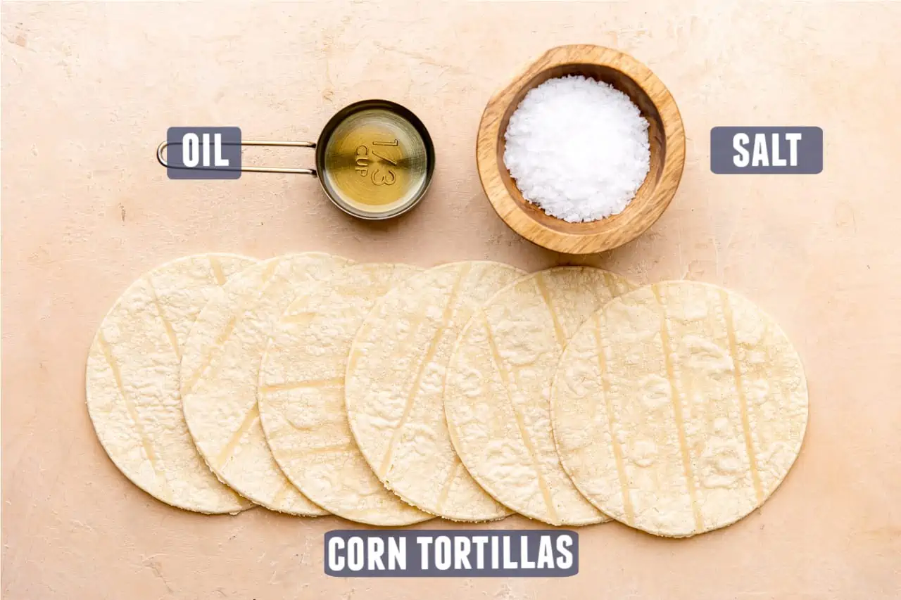 Ingredients needed to make homemade tortilla chips laid out on the counter.
