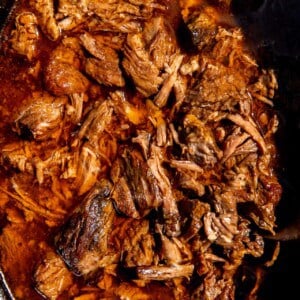 Slow Cooker filled with shredded Mexican style beef.