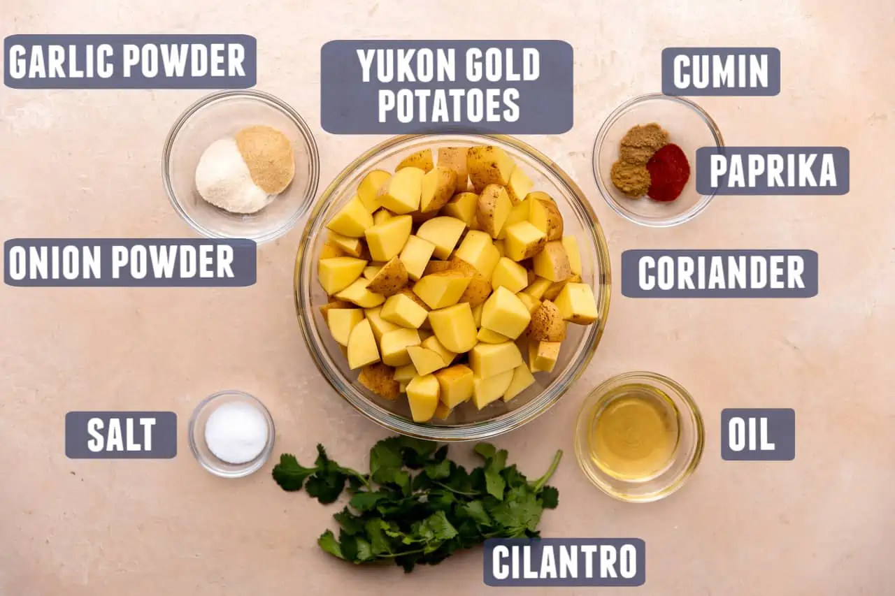 Ingredients needed to make Tex Mex style roasted potatoes laid out on the counter.