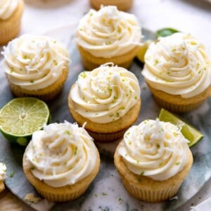 Tray filled with coconut lime cupcakes.