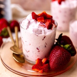 Fresas con Crema served with extra strawberries.