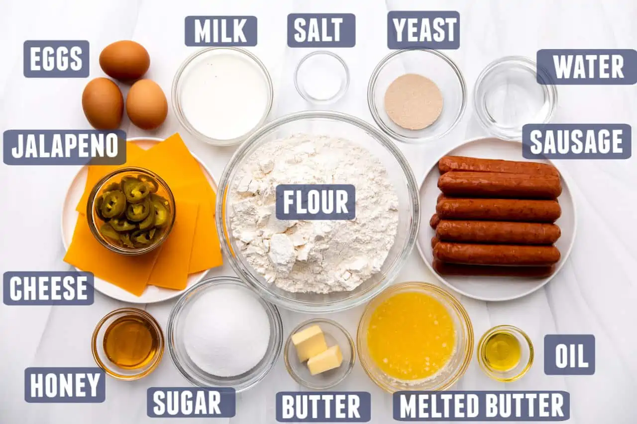 Ingredients needed to make sausage kolaches laid out on the counter.
