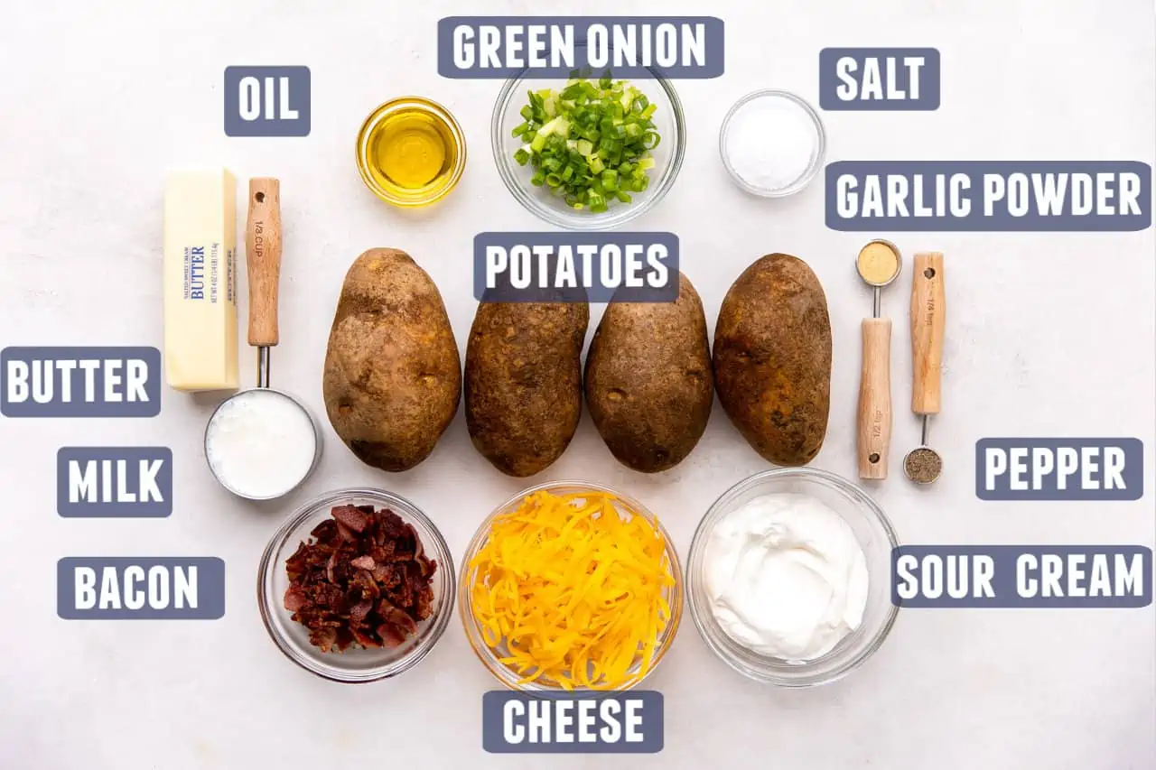 Ingredients needed to make twice baked potatoes laid out on the counter. 