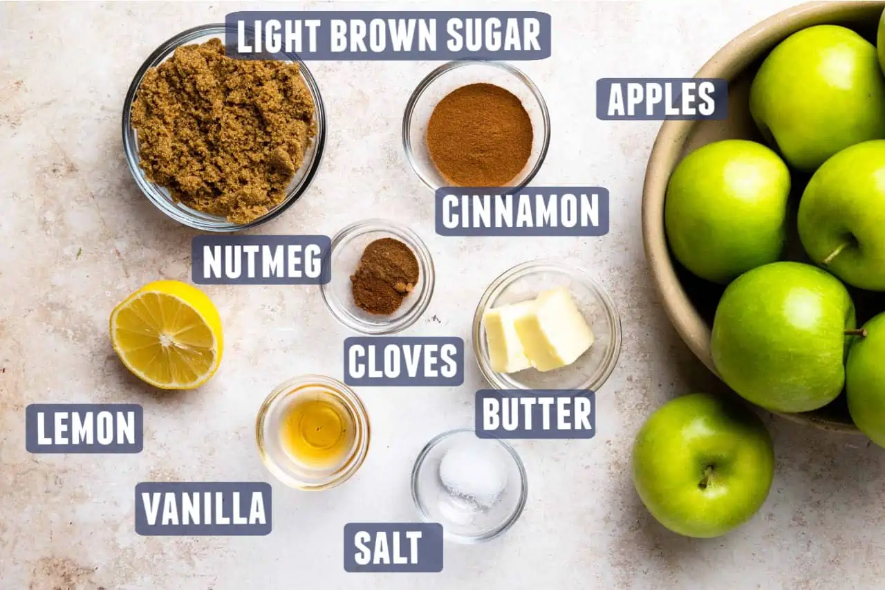 Ingredients needed to make baked apples laid out on the counter. 
