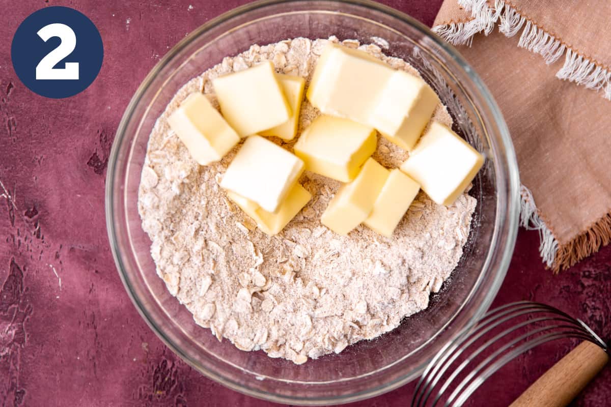 Flour and oats with sliced butter for making a crisp topping for fruit. 