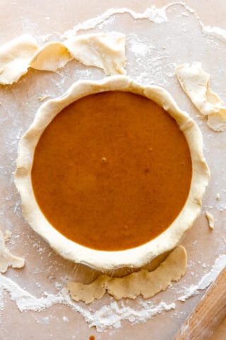 Pie filling poured into pie crust.