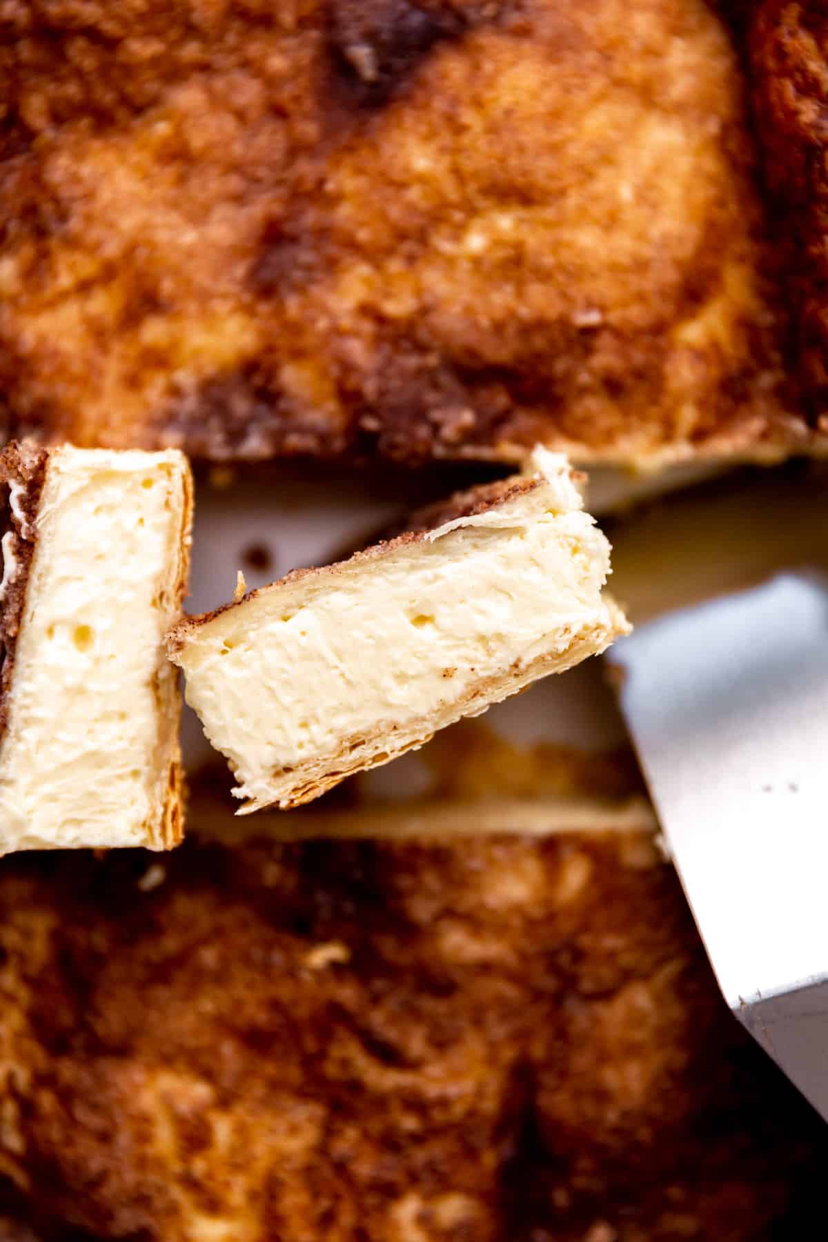 Up close view of the center cheesecake layer of sopapilla cheesecake bars. 