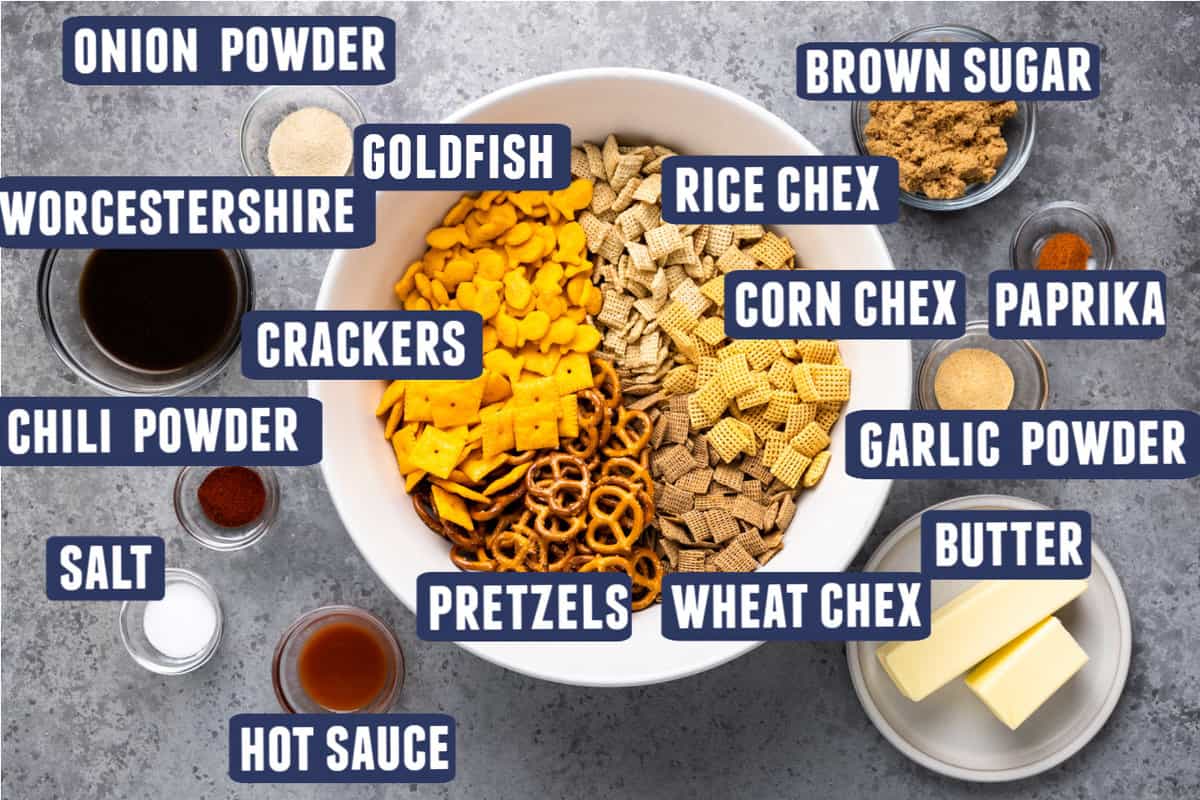 Ingredients needed to make a spicy chex mix laid out on the counter.