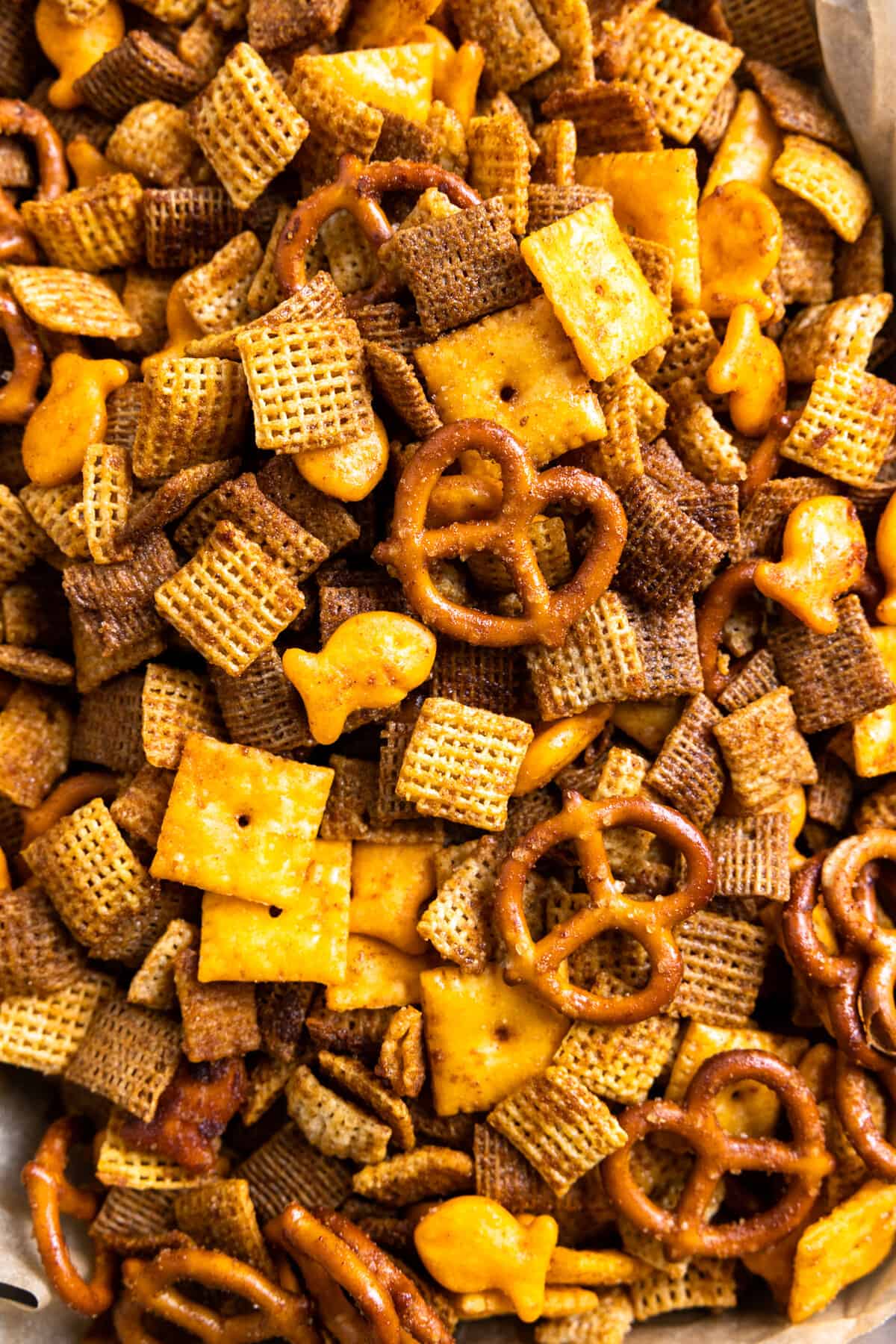 Up close view of Texas Trash loaded up with Chex cereals, pretzels, cheese cracker and goldfish.