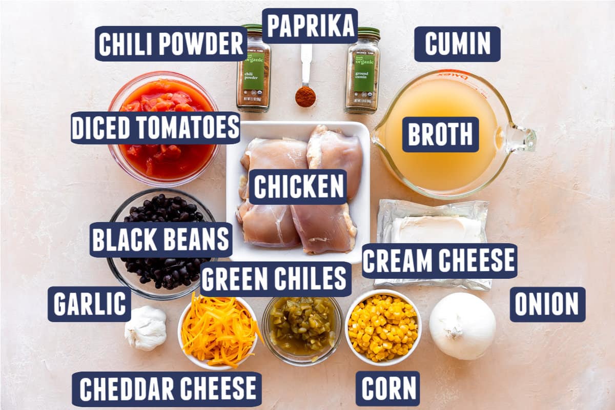 Ingredients needed to make creamy chicken taco soup laid out on the counter. 
