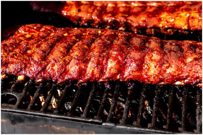 Smoked ribs with sauce in a smoker.