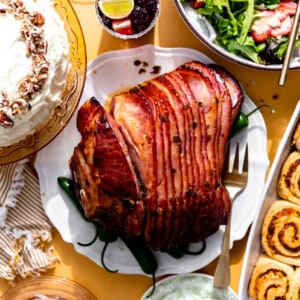 Easter table setting with a jalapeno honey glazed ham as the center piece.