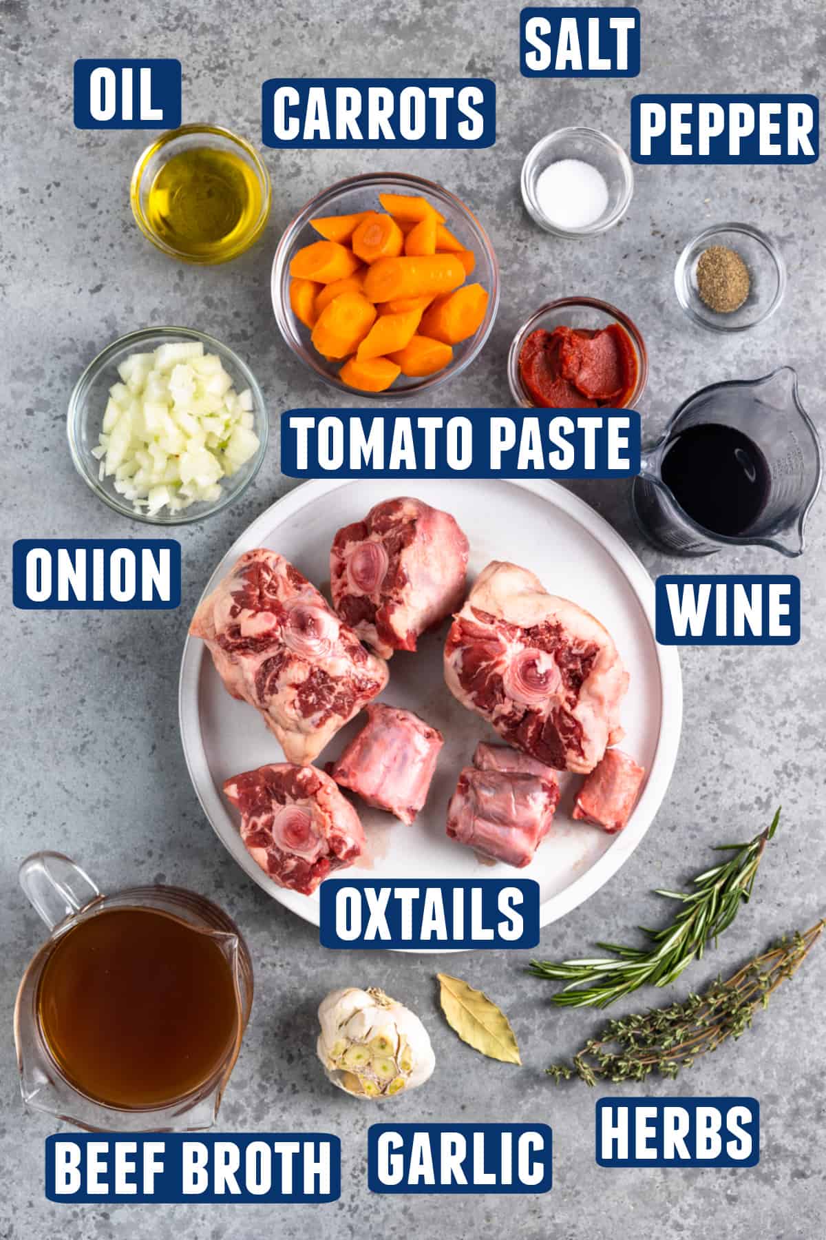 Ingredients needed to make braised oxtails laid out on the counter. 