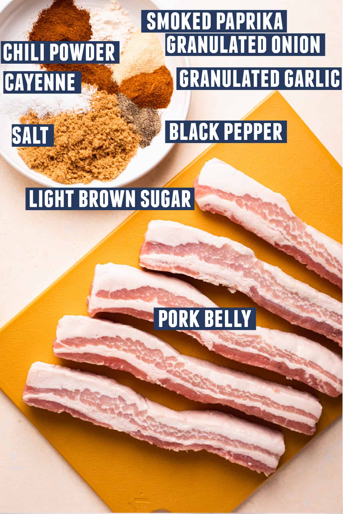 Ingredients needed to make smoked pork belly laid out on the counter. 