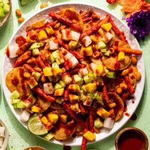 White plate with layered Tostilocos.