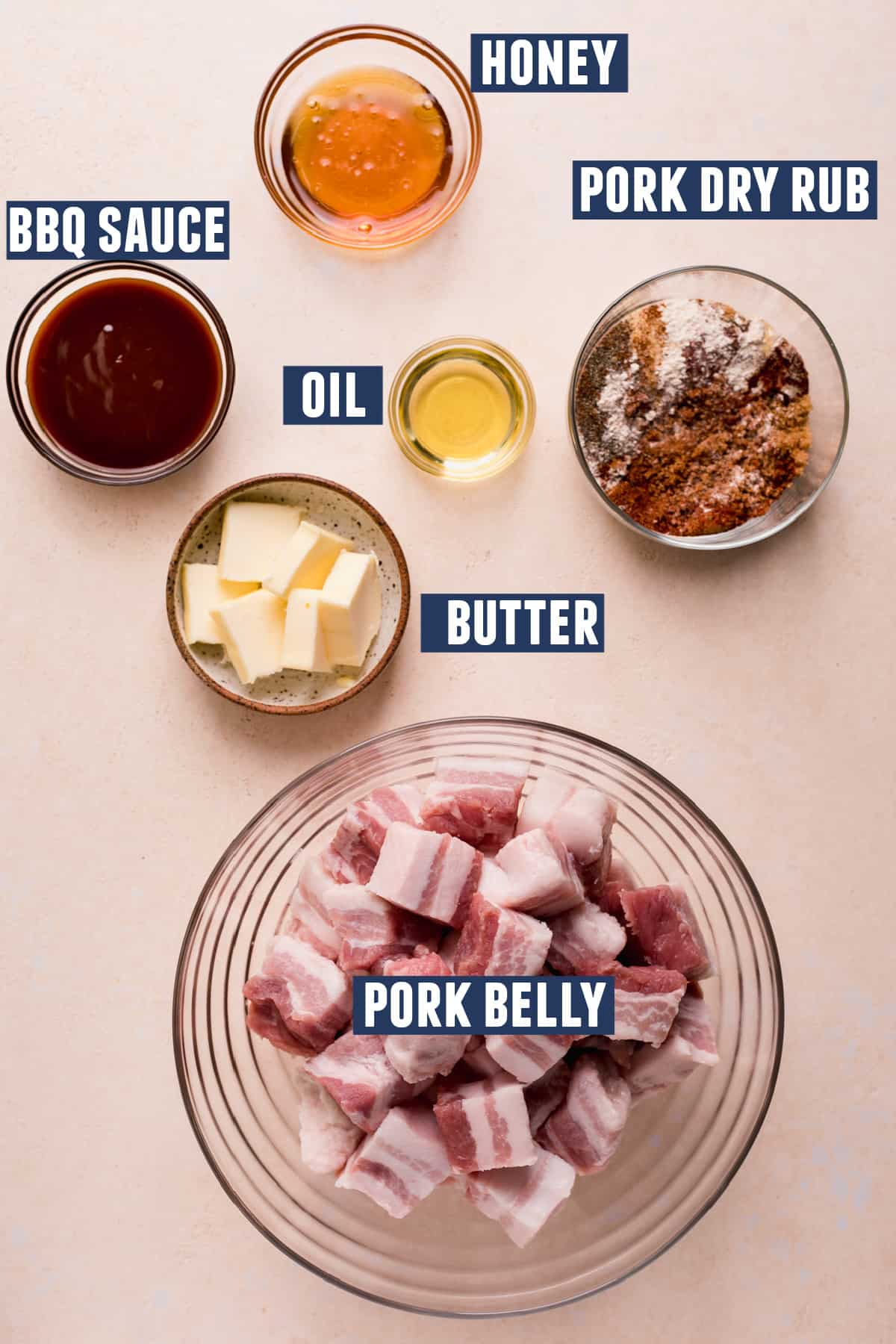 Ingredients needed to make pork belly burnt ends laid on the counter.