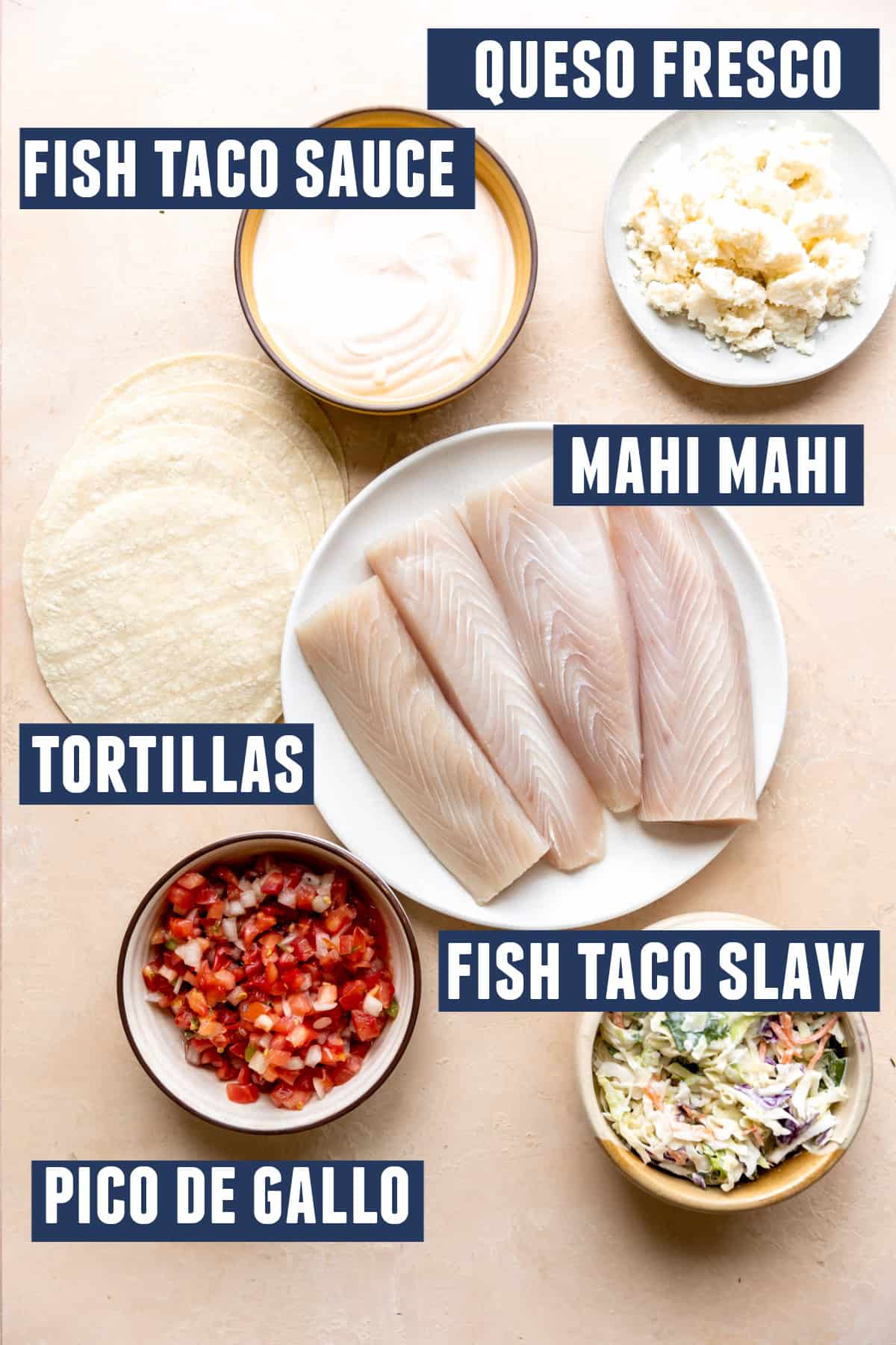 Ingredients needed to make Baja fish tacos laid out on the counter. 