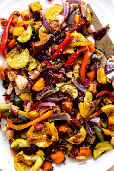 Plate of roasted mexican vegetables on a white plate.