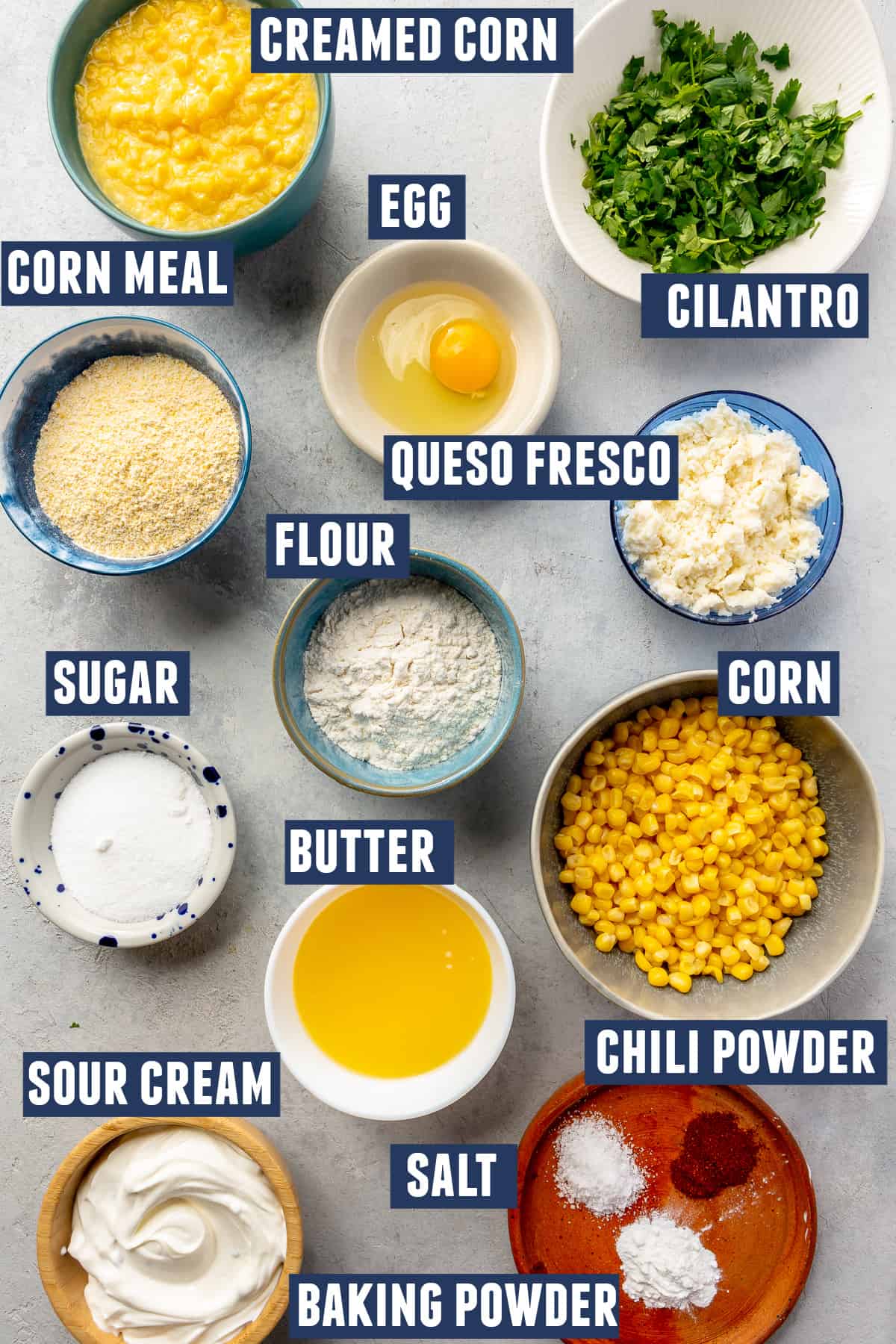 Ingredients needed to make Mexican corn casserole laid on the counter. 