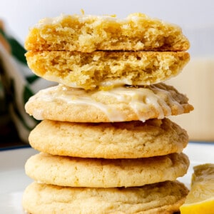 Stack of lemon cookies with glaze.