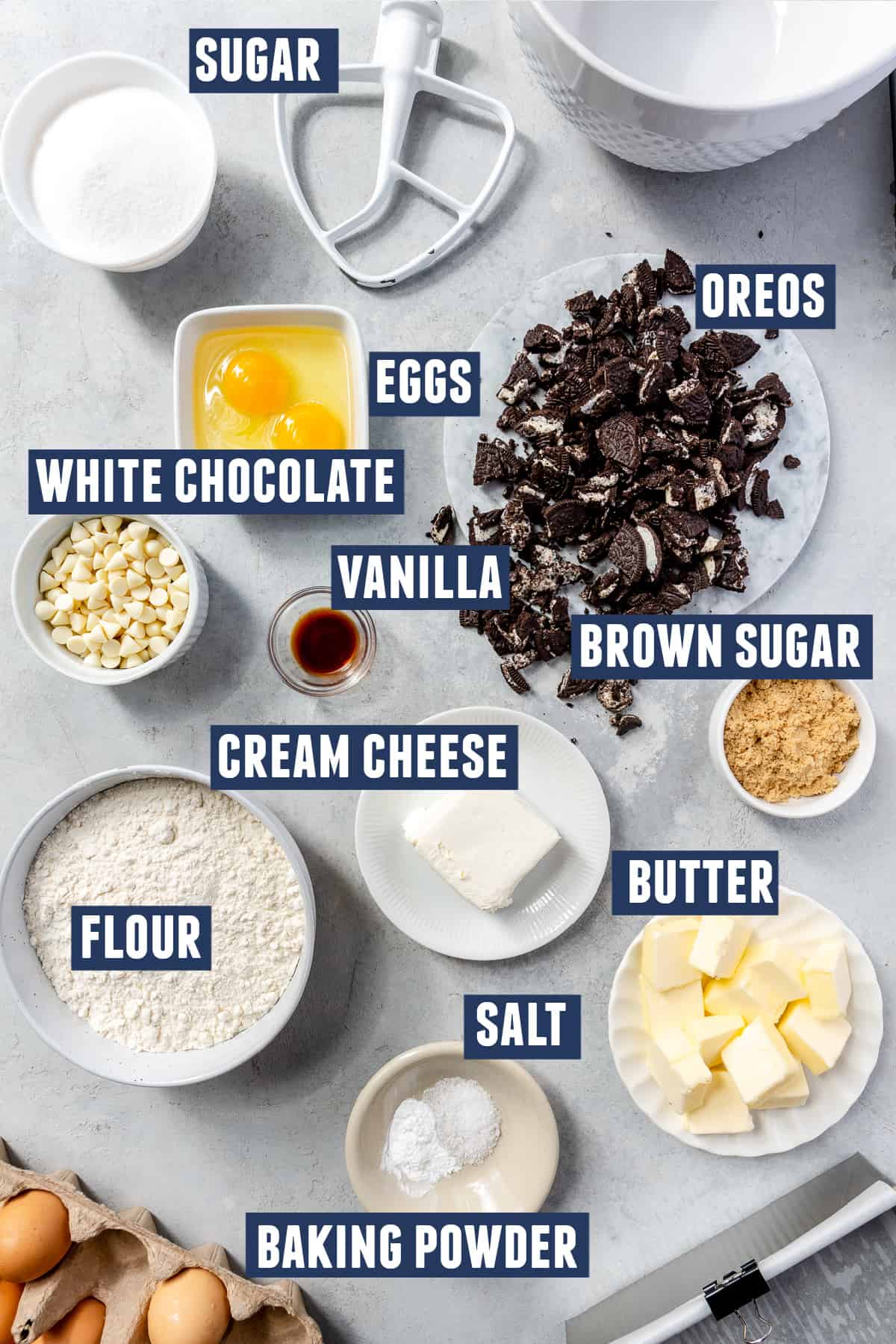 Ingredients needed to make Oreo bars laid out on the counter. 
