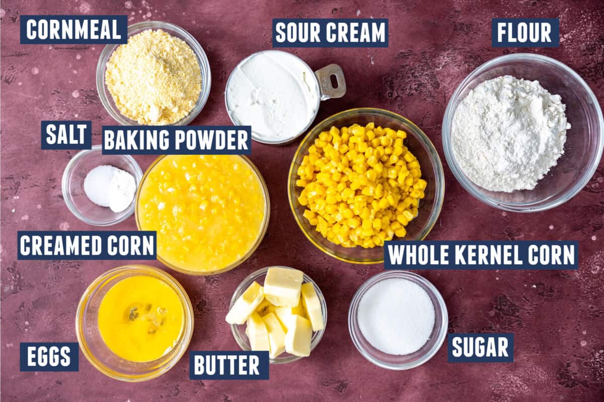 Ingredients needed to make corn casserole laid out on the counter.