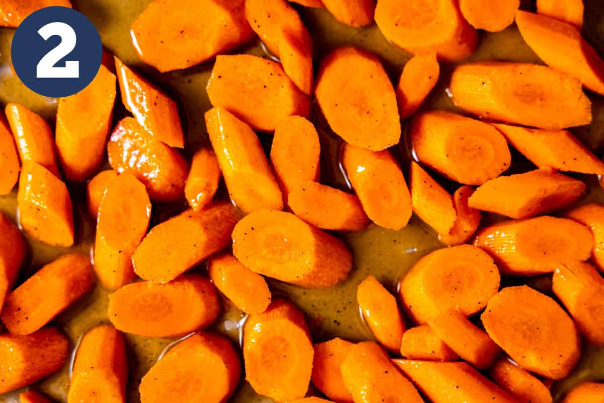 Carrots coated in a honey butter mixture for roasting.