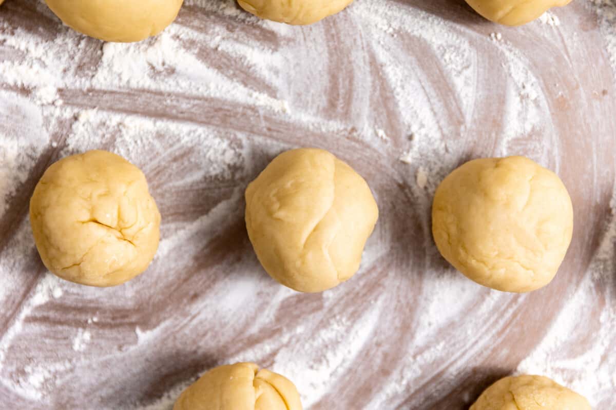 Balls of tortilla dough resting. 