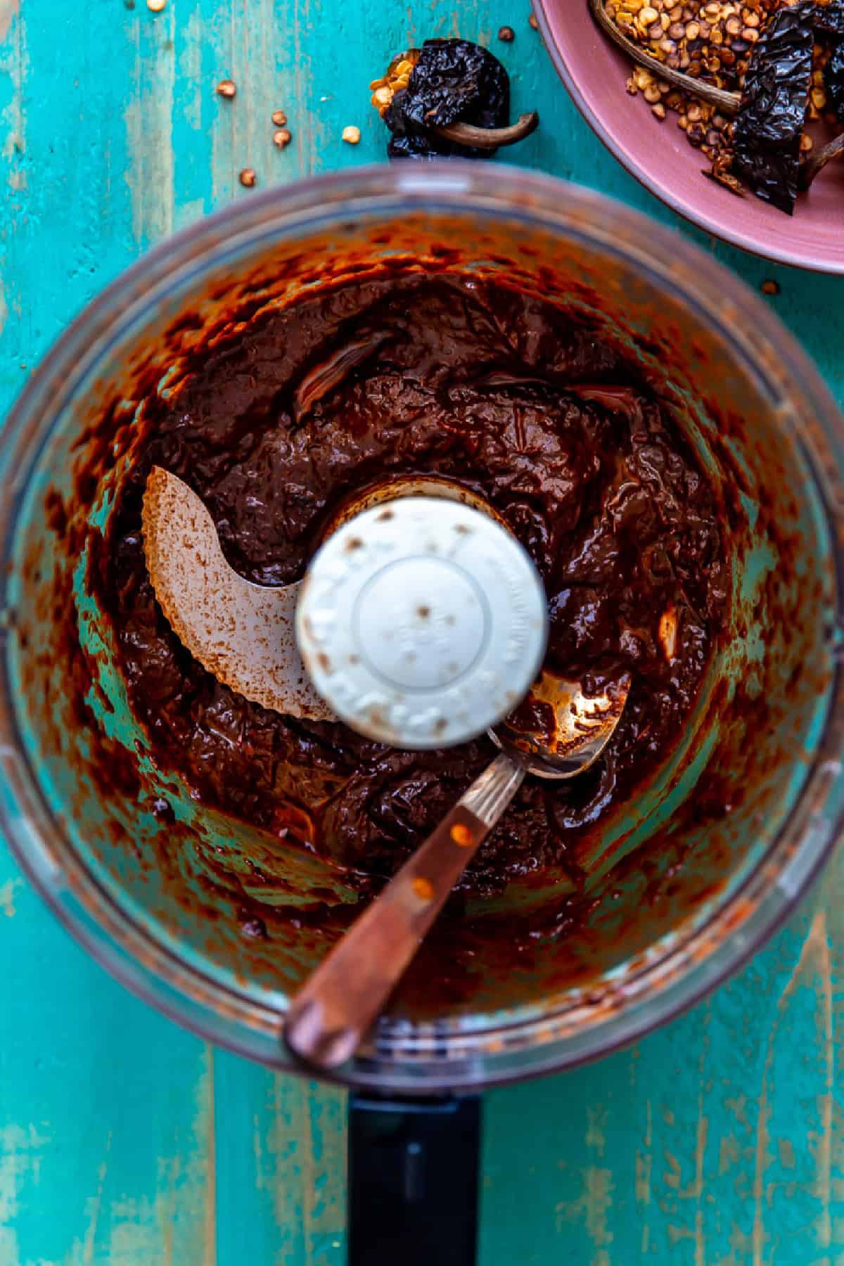 Blending Chile peppers to make a rich broth for making birria meat.