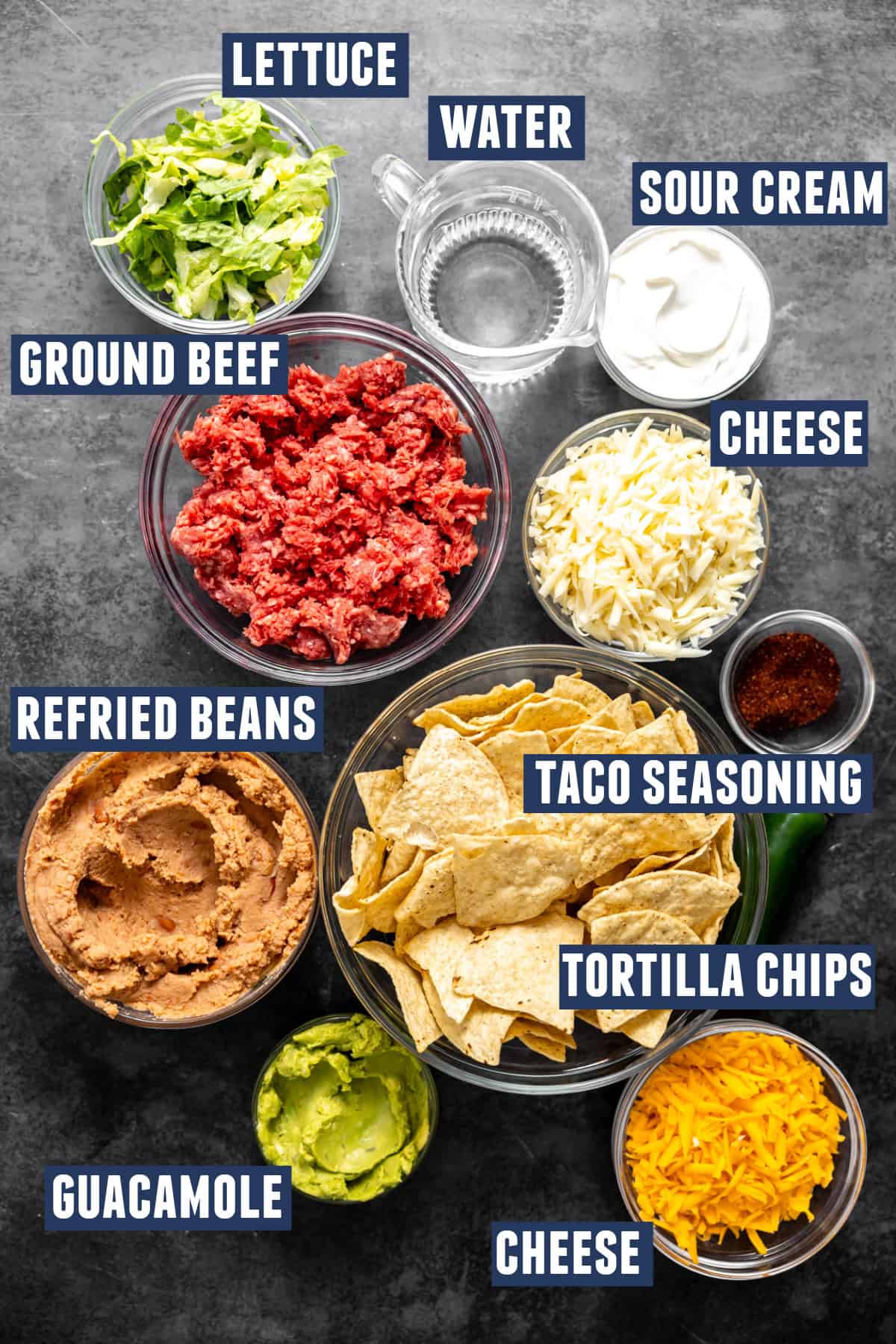 Ingredients needed to make sheet pan nachos with ground beef. 