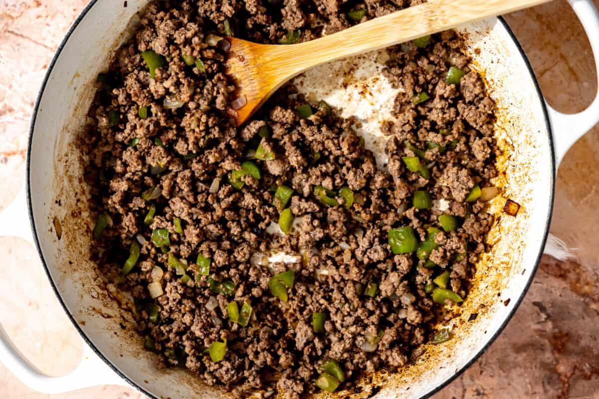 Cooked ground beef in a skillet. 