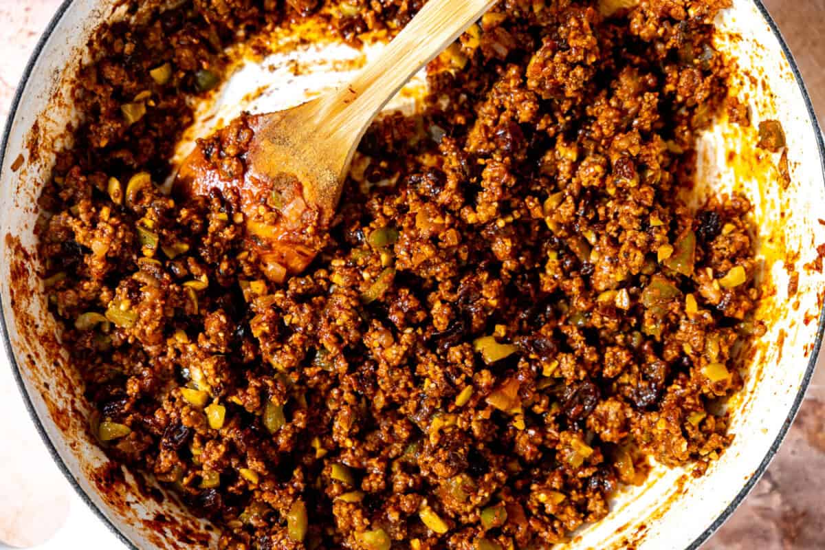 Fully prepared cuban picadillo in a skillet. 