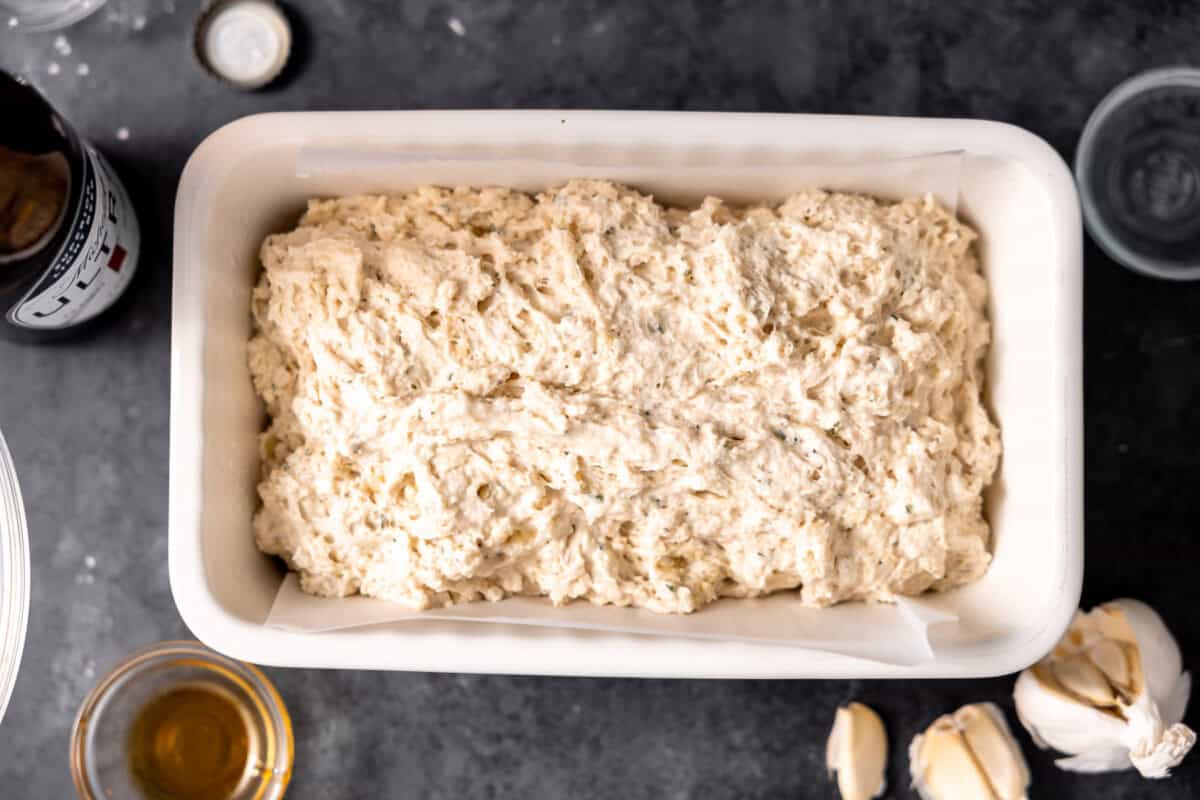 Beer bread batter in a loaf pan. 