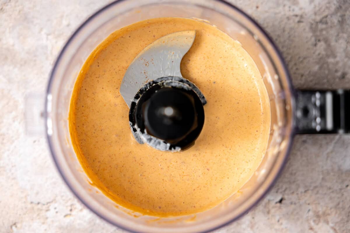 Blended chipotle may in a food processor.