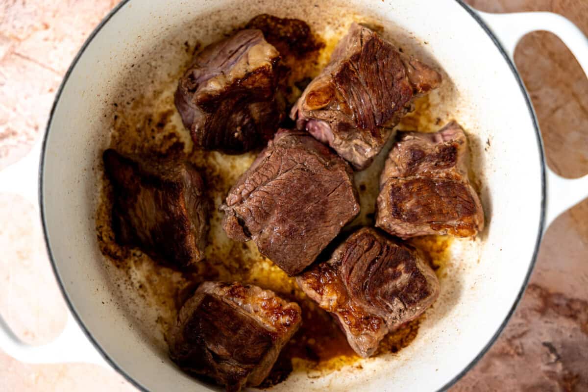 Searing large pieces of chuck roast in a dutch oven. 