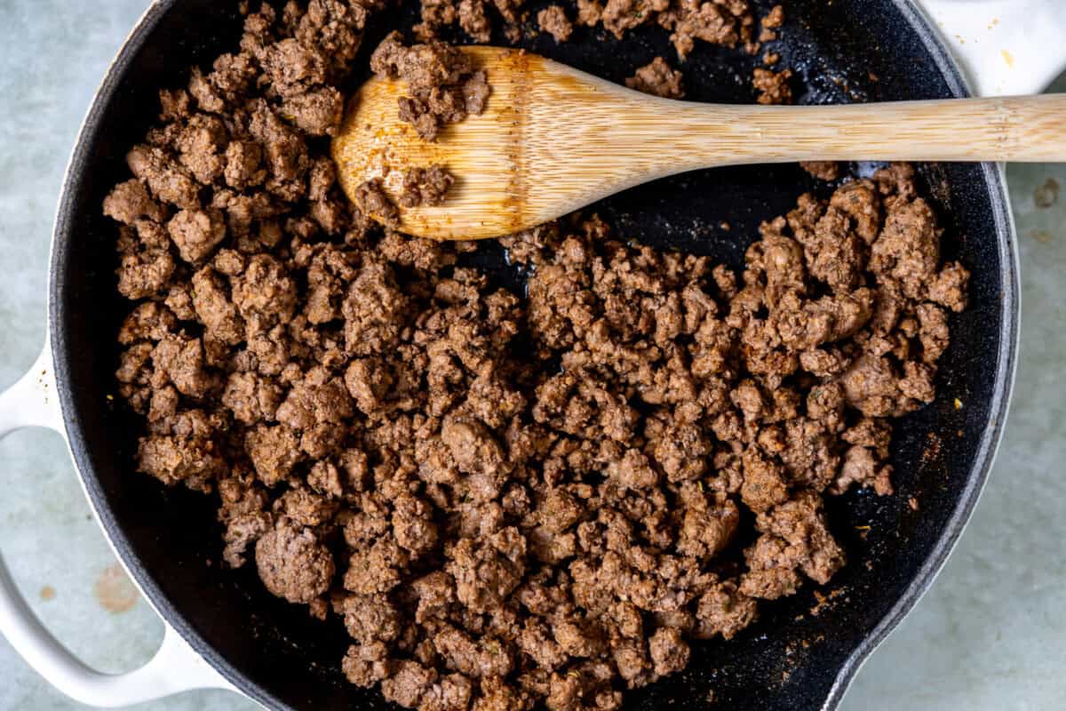 Cooked taco meat in a skillet. 