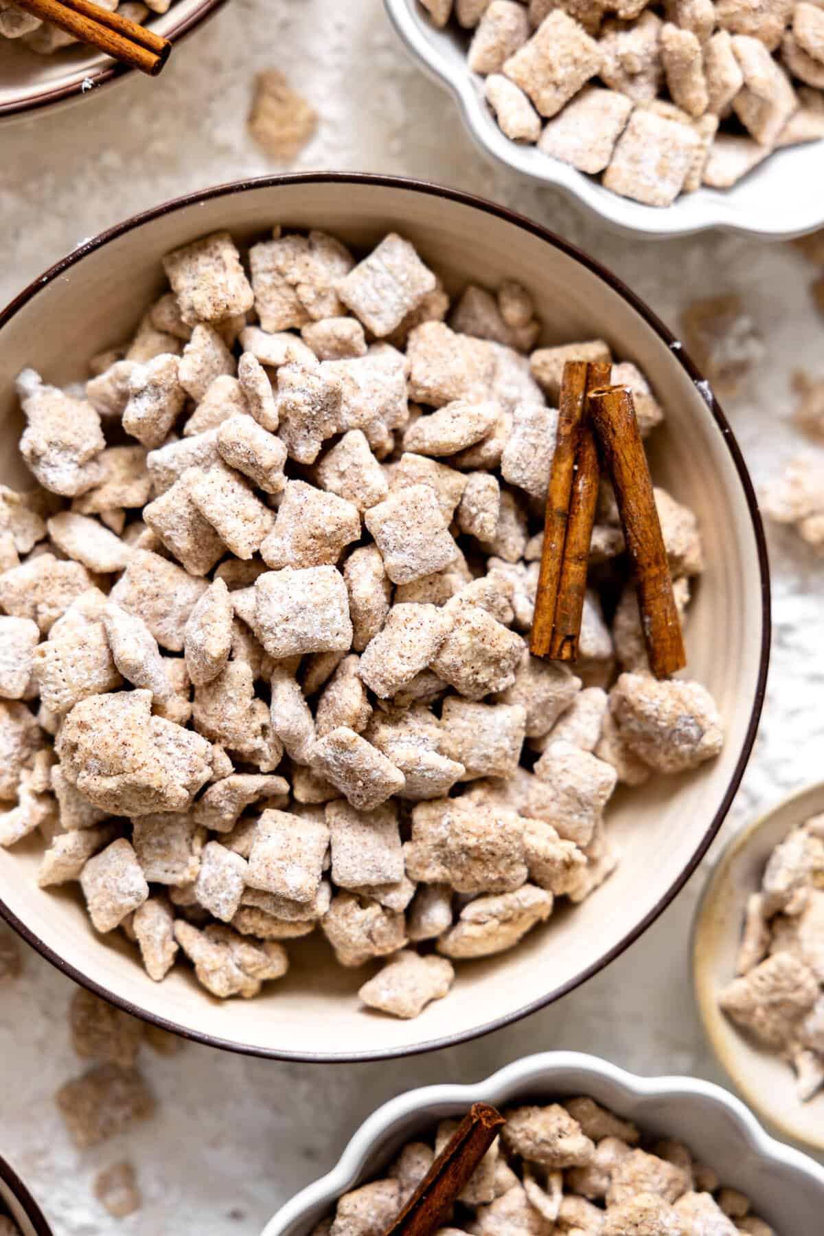 Bowl filled with churro muddy buddies. 