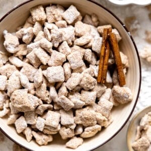 Bowl filled with churro muddy buddies.