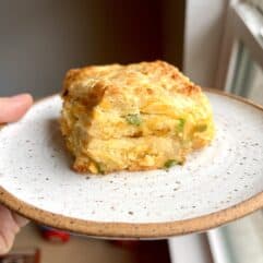 Homemade cheddar jalapeno biscuit on a plate. 