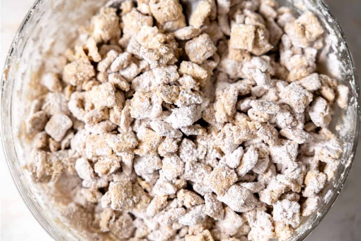 Chex coated with white chocolate and powdered sugar mixture. 