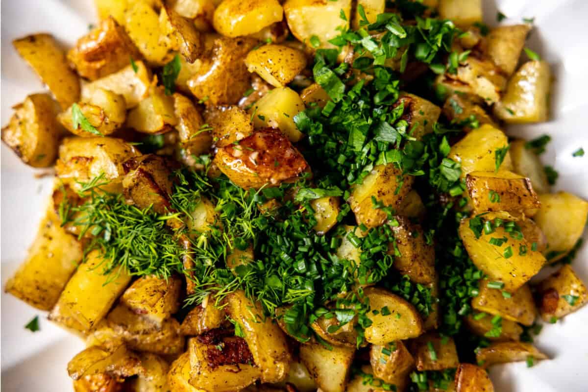 Roasted potatoes with a dijon vinaigrette and fresh herbs added. 