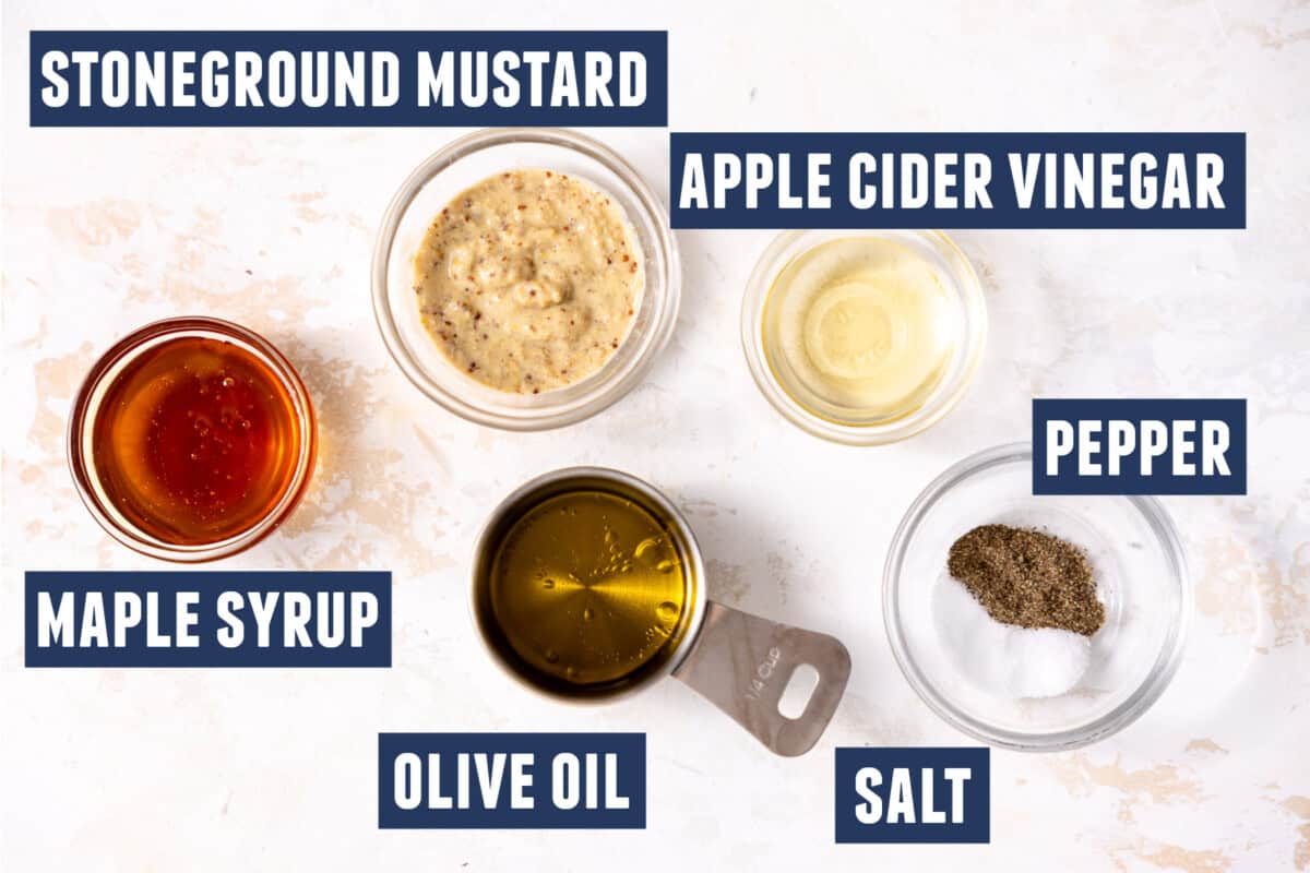 Ingredients needed to make a maple mustard dressing for a kale salad. 