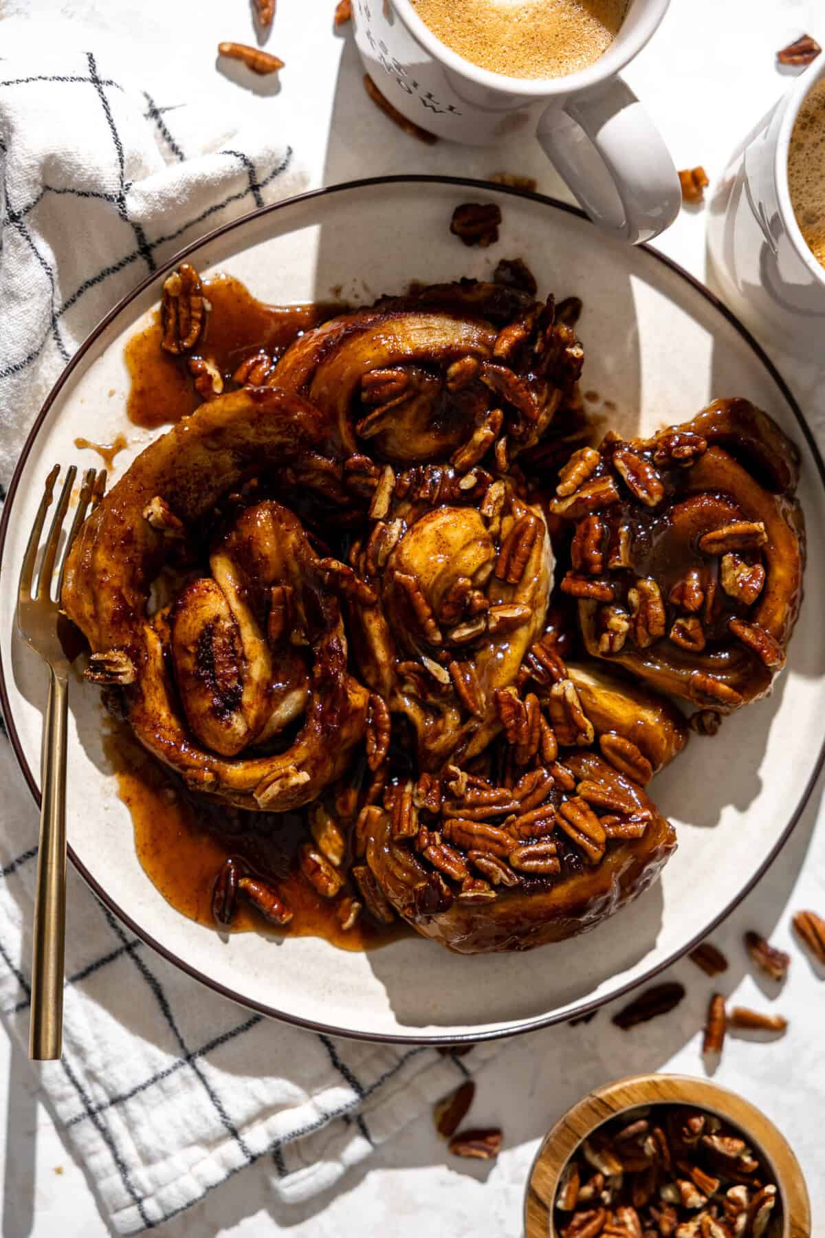 Plate of sticky buns set for breakfast.