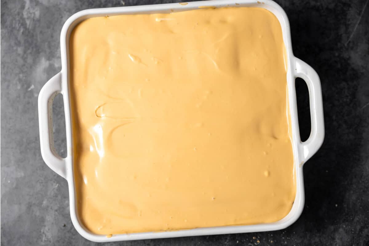 Baking dish filled with dulce de leche tiramisu before chilling it. 