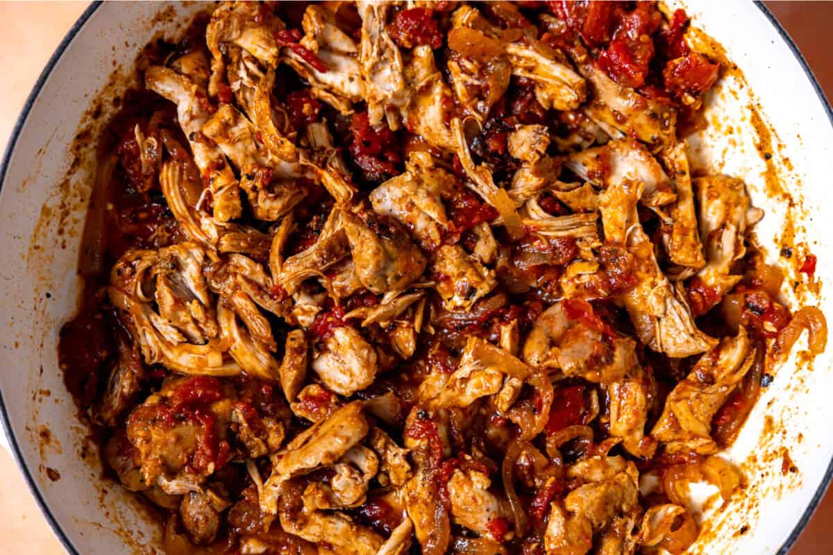 Shredded chicken that has been slow roasted in a skillet. 