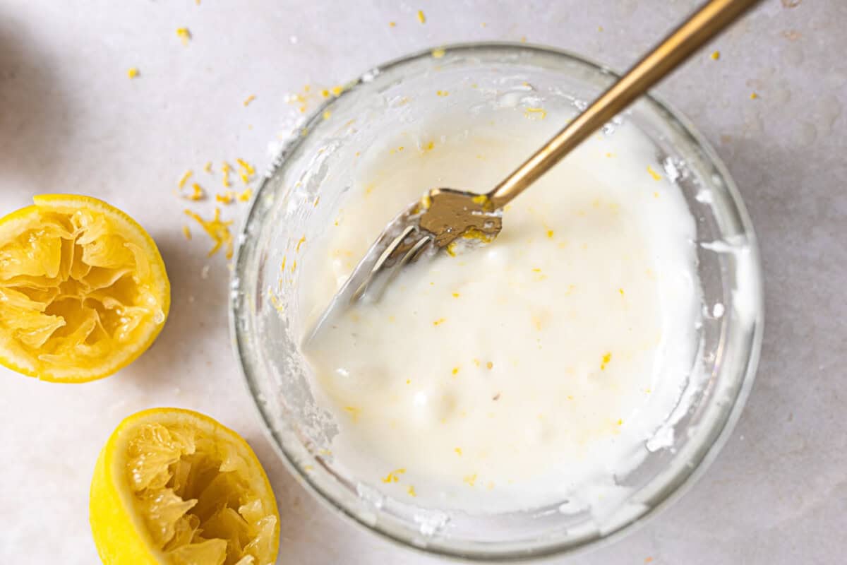 Lemon glaze in a bowl.