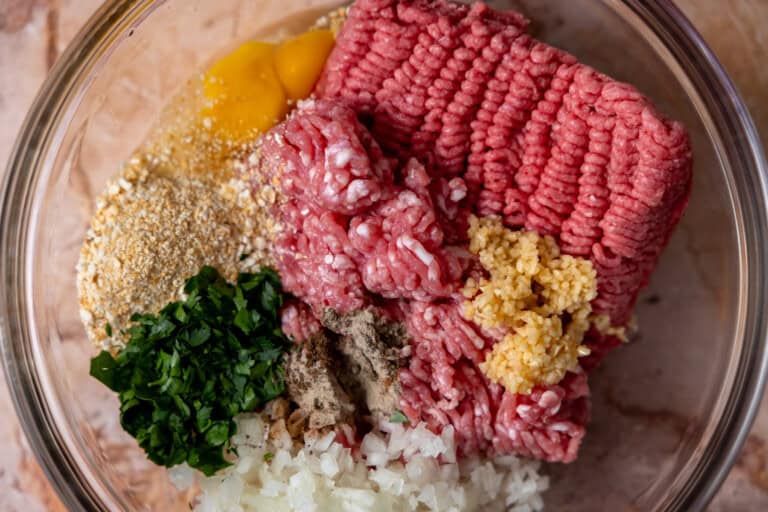 Swedish meatball ingredients in a large mixing bowl.