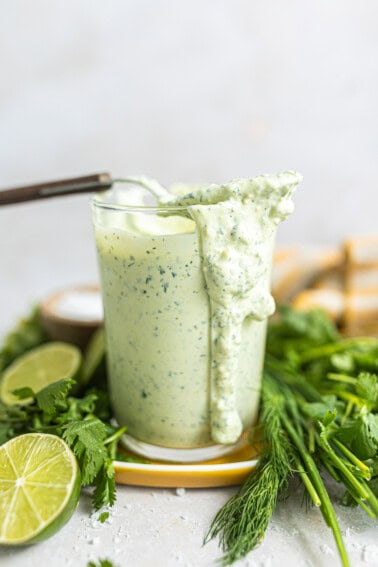 Avocado ranch dressing in a glass