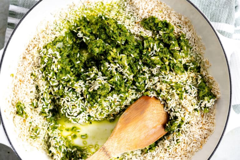 Blended greens added to toasted rice.