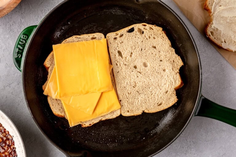 Toasting bread with cheese.
